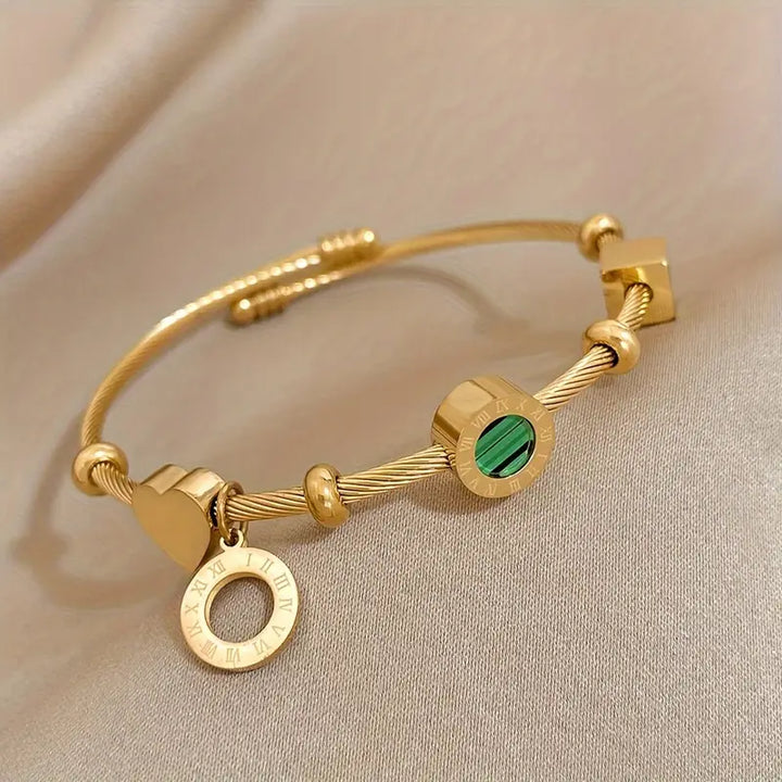 Golden Bracelet with a Green Gemstone